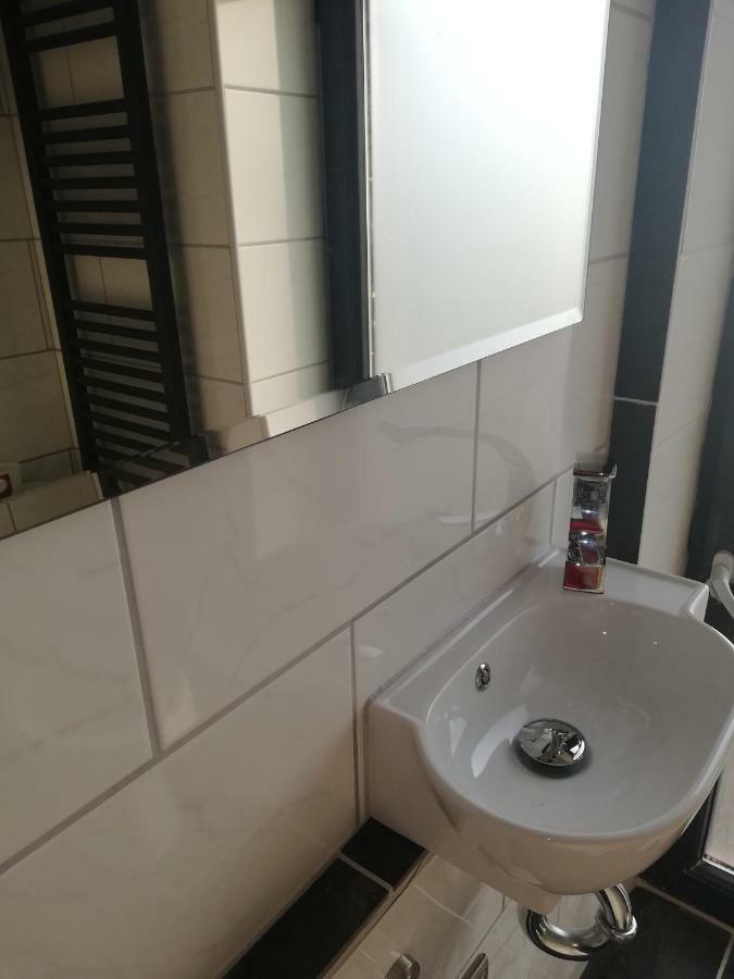 Am Ententeich Bergstrasse 15 Апартаменты Бюзум